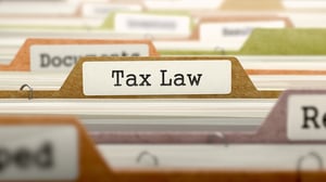 Tax Law - Folder Register Name in Directory. Colored, Blurred Image. Closeup View.-1