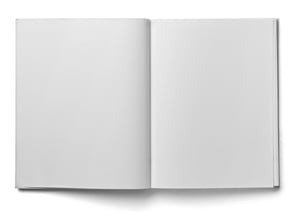 close up of a blank white book on white background